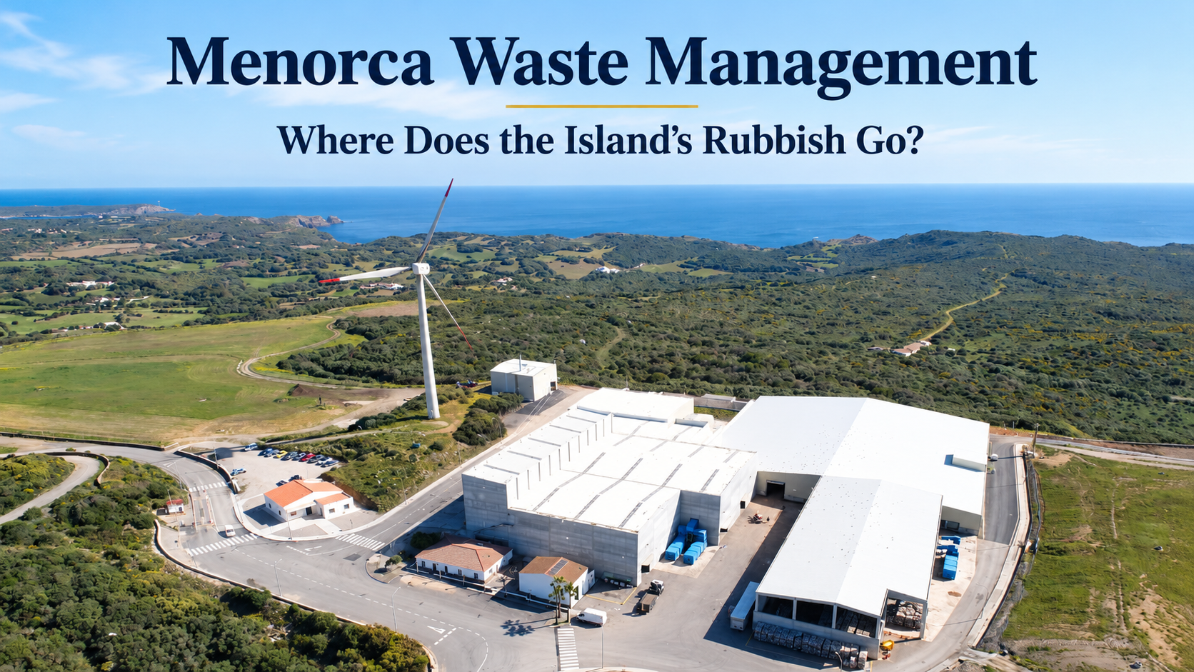 Menorca waste management at the Milà Environmental Complex near Maó, showing waste treatment buildings, a wind turbine and the surrounding countryside.